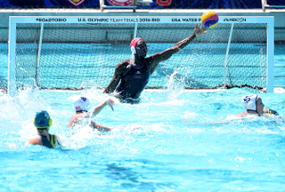 Ashleigh Johnson of the United States makes a save on a shot during the 2016 Olympic team trials at the Uytengsu Aquatics Center on May 22, 2016 in Los Angeles.